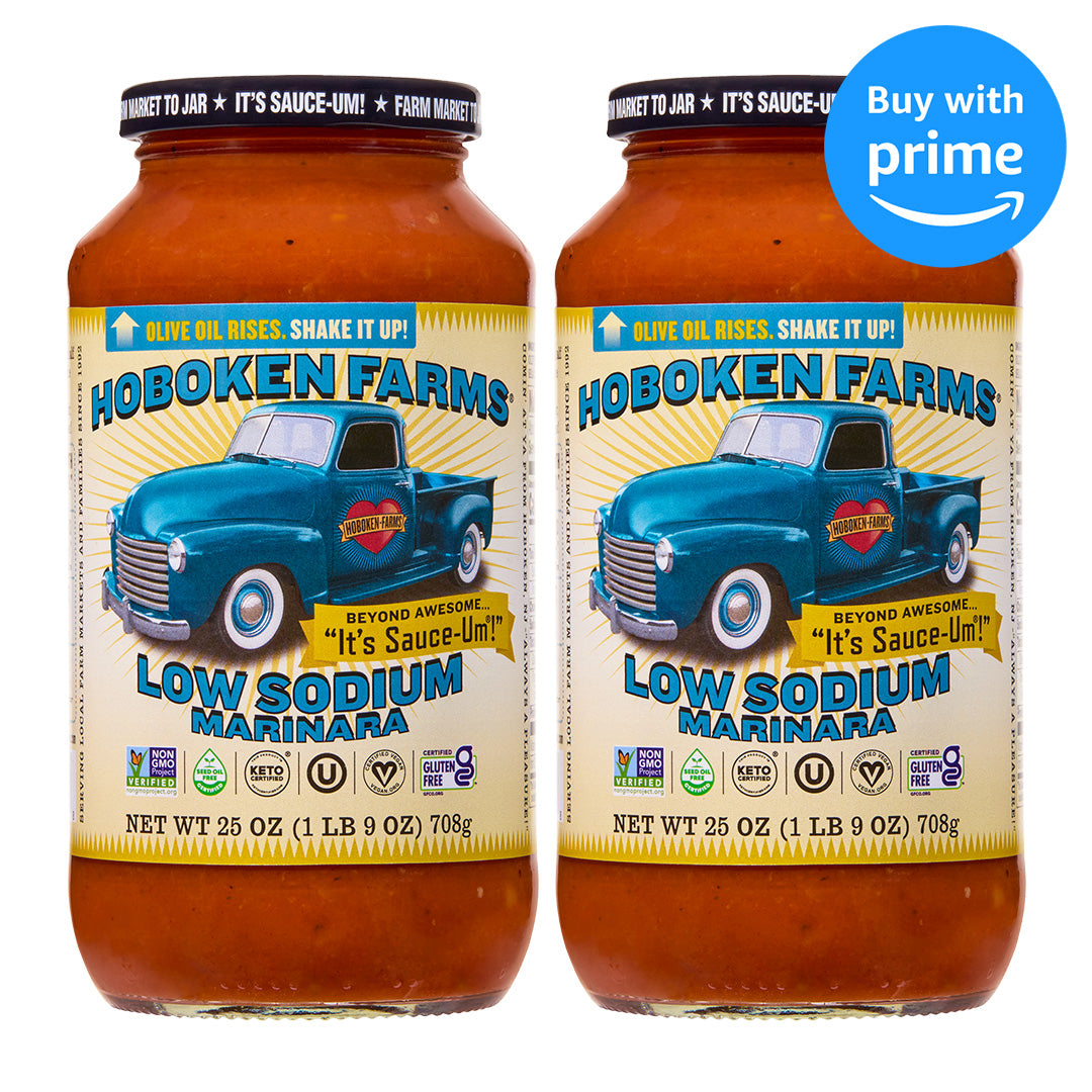 Two bottles of Hoboken Farms Low Sodium Marinara sauce with a blue truck graphic on the label.